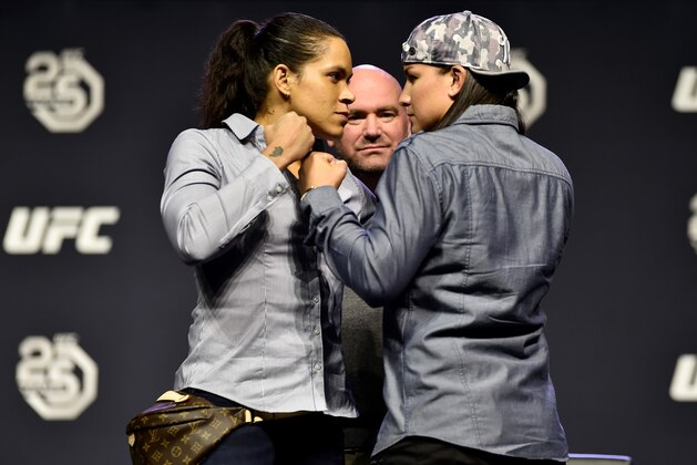 BROOKLYN, NEW YORK - APRIL 06:   (L-R) Opponents Amanda Nunes and Raquel Pennington face off during the UFC press conference inside Barclays Center on April 6, 2018 in Brooklyn, New York. (Photo by Jeff Bottari/Zuffa LLC/Zuffa LLC via Getty Images)