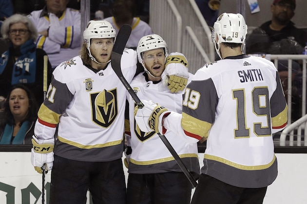 Vegas Golden Knights' Jonathan Marchessault, center, celebrates his goal with teammates William Karlsson, left, and Reilly Smith (19) during the second period of Game 6 of an NHL hockey second-round playoff series against the San Jose Sharks Sunday, May 6, 2018, in San Jose, Calif. (AP Photo/Marcio Jose Sanchez)
