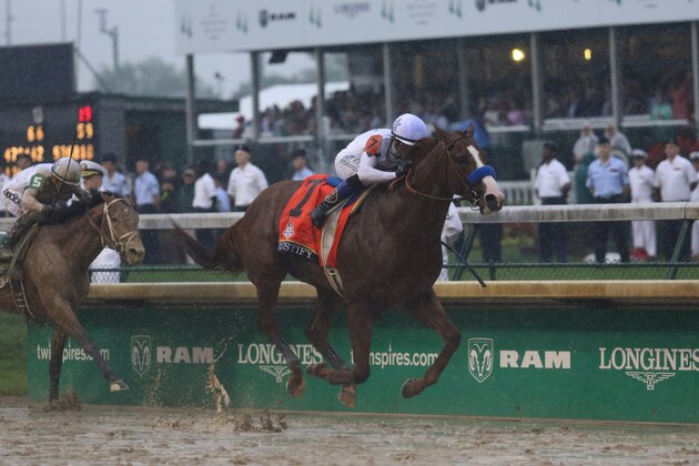 LOUISVILLE, KENTUCKY- MAY 5: Justify with Mike Smith wins the 2018 Kentucky Derby at Churchill Downs Racetrack on May 5, 2018 in Louisville, Kentucky.  (Photo by Horsephotos/Getty Images)