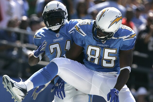 San Diego Chargers' Antonio Gates, right, and LaDainian Tomlinson celebrate Tomlinson's 27 yard touchdown run in the first quarter of an NFL football game against the Oakland Raiders  Sunday, Oct. 14, 2007 in San Diego.  (AP Photo/Lenny Ignelzi)