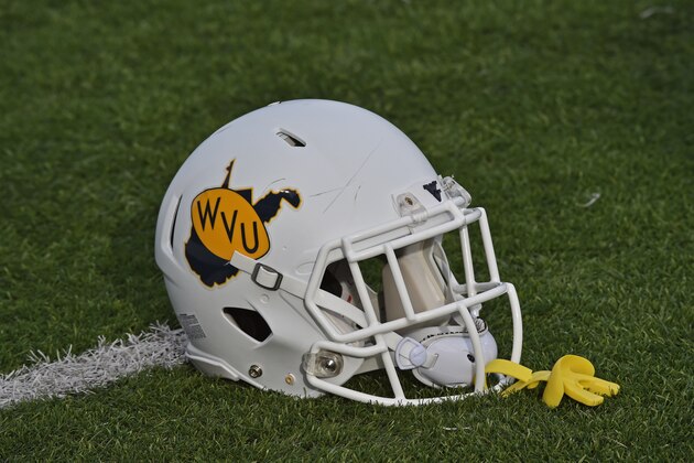 MANHATTAN, KS - DECEMBER 05:  A general view of a West Virginia Mountaineers helmet prior to a game against the Kansas State Wildcats on December 5, 2015 at Bill Snyder Family Stadium in Manhattan, Kansas.  (Photo by Peter G. Aiken/Getty Images)