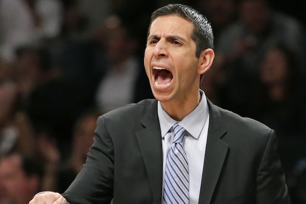 Orlando Magic interim head coach James Borrego shouts in the second half of an NBA basketball game, Wednesday, April 15, 2015, in New York. The Nets defeated the Magic 101-88. (AP Photo/Kathy Willens)