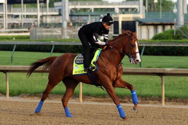 LOUISVILLE, KY - MAY 10: Kentucky Derby winner Justify, with exercise rider Humberto Gomez, gallops at Churchill Downs on May 10, 2018 in Louisville, Kentucky. It was his first visit to the track since his Kentucky Derby win five days earlier. (Photo by Mary M. Meek/Eclipse Sportswire/Getty Images)