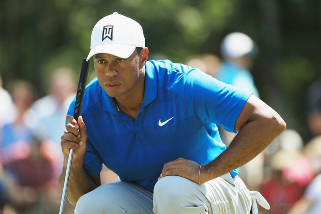 PONTE VEDRA BEACH, FL - MAY 10:  Tiger Woods of the United States lines up a putt on the sixth green during the first round of THE PLAYERS Championship on the Stadium Course at TPC Sawgrass on May 10, 2018 in Ponte Vedra Beach, Florida.  (Photo by Mike Ehrmann/Getty Images)