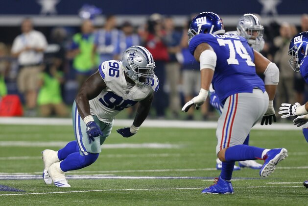Dallas Cowboys defensive tackle Maliek Collins (96) rushes against New York Giants offensive tackle Ereck Flowers (74) during an NFL football game, Sunday, Sept. 10, 2017, in Arlington, Texas. (AP Photo/Roger Steinman)