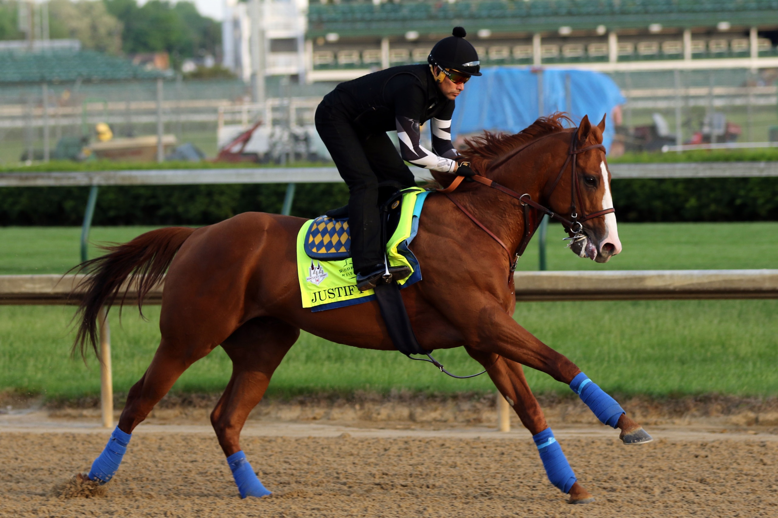 LOUISVILLE, KY - MAY 10: Kentucky Derby winner Justify, with exercise rider Humberto Gomez, gallops at Churchill Downs on May 10, 2018 in Louisville, Kentucky. It was his first visit to the track since his Kentucky Derby win five days earlier. (Photo by Mary M. Meek/Eclipse Sportswire/Getty Images)