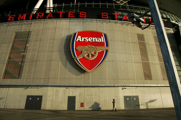 The club badge is seen on a section of Arsenal's Emirates Stadium in north London, Wednesday Dec. 6, 2006. Faint levels of radioactive polonium-210 have been found at two locations at the stadium, where Andrei Lugovoi, a key figure in the investigation of the death of the former Russian spy Alexander Litvinenko, attended a soccer match on Nov. 1, a British official said Wednesday.  (AP Photo/Matt Dunham)