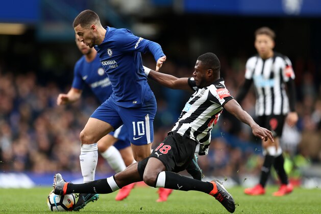 LONDON, ENGLAND - JANUARY 28: Eden Hazard of Chelsea is tackled by Chancel Mbemba of Newcastle United during the Emirates FA Cup Fourth Round match between Chelsea and Newcastle United on January 28, 2018 in London, United Kingdom. (Photo by Catherine Ivill/Getty Images)