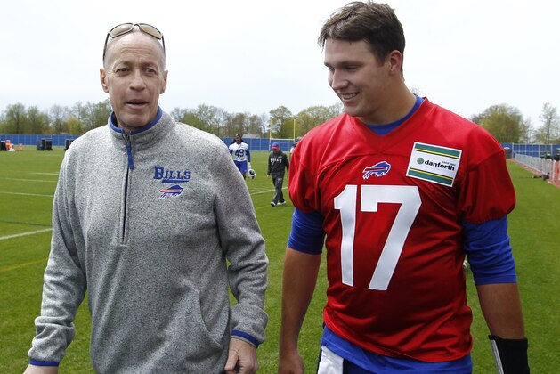 Buffalo Bills rookie quarterback Josh Allen (17) walks with Hall of Fame quarterback Jim Kelly following the team's NFL football rookie minicamp, Friday, May 11, 2018, in Orchard Park, N.Y. (AP Photo/Jeffrey T. Barnes)