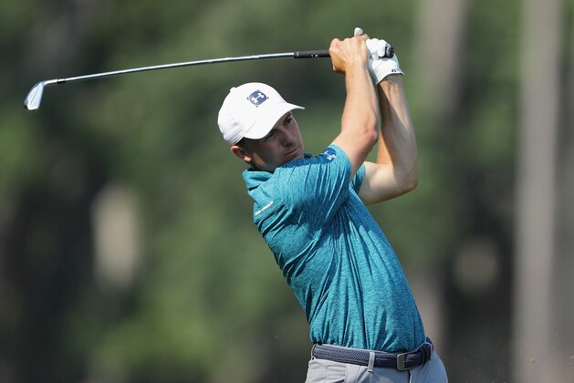 PONTE VEDRA BEACH, FL - MAY 11:  Jordan Spieth of the United States plays a shot on the 11th hole during the second round of THE PLAYERS Championship on the Stadium Course at TPC Sawgrass on May 11, 2018 in Ponte Vedra Beach, Florida.  (Photo by Richard Heathcote/Getty Images)