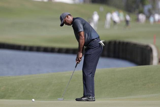 Tiger Woods hits on the 16th hole during the second round of the Players Championship golf tournament, Friday, May 11, 2018, in Ponte Vedra Beach, Fla. (AP Photo/Lynne Sladky)