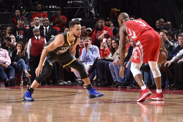 HOUSTON, TX - JANUARY 20: Stephen Curry #30 of the Golden State Warriors defends against Chris Paul #3 of the Houston Rockets during the game between the two teams on January 20, 2018 at the Toyota Center in Houston, Texas. NOTE TO USER: User expressly acknowledges and agrees that, by downloading and or using this photograph, User is consenting to the terms and conditions of the Getty Images License Agreement. Mandatory Copyright Notice: Copyright 2018 NBAE (Photo by Bill Baptist/NBAE via Getty Images)