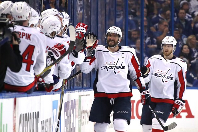 TAMPA, FL - MAY 11:  Alex Ovechkin #8 of the Washington Capitals celebrates with his teammates  after Lars Eller #20 scored a goal against Andrei Vasilevskiy #88 of the Tampa Bay Lightning during the second period in Game One of the Eastern Conference Finals during the 2018 NHL Stanley Cup Playoffs at Amalie Arena on May 11, 2018 in Tampa, Florida.  (Photo by Bruce Bennett/Getty Images)