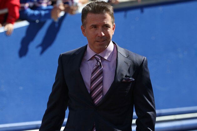 ORCHARD PARK, NY - SEPTEMBER 20: President Russ Brandon of the Buffalo Bills walks onto the field before the start of NFL game action against the New England Patriots at Ralph Wilson Stadium on September 20, 2015 in Orchard Park, New York. (Photo by Tom Szczerbowski/Getty Images)