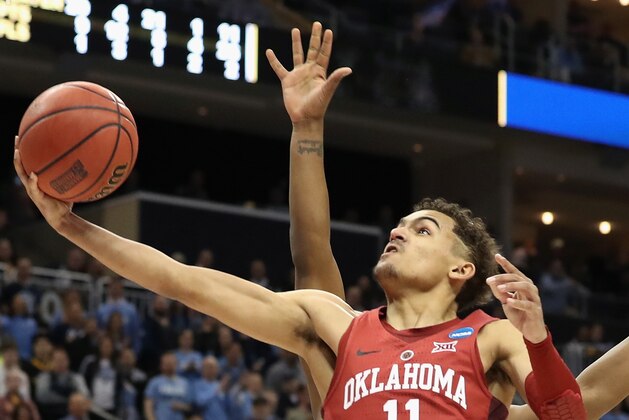 PITTSBURGH, PA - MARCH 15:  Trae Young #11 of the Oklahoma Sooners lays up against the Rhode Island Rams in the second half of the game during the first round of the 2018 NCAA Men's Basketball Tournament at PPG PAINTS Arena on March 15, 2018 in Pittsburgh, Pennsylvania.  (Photo by Rob Carr/Getty Images)