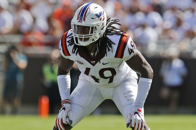 Virginia Tech linebacker Tremaine Edmunds (49) waits for the snap during the first half of the Old Dominion Virginia Tech NCAA college football game in Blacksburg, Va., Saturday, Sept. 23, 2017. (AP Photo/Steve Helber)