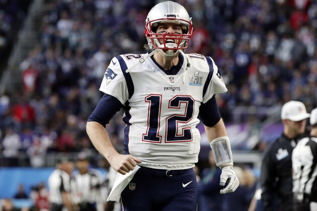New England Patriots quarterback Tom Brady (12), runs to the field to warmup before the NFL Super Bowl 52 football game against the Philadelphia Eagles, Sunday, Feb. 4, 2018, in Minneapolis. (AP Photo/Frank Franklin II)