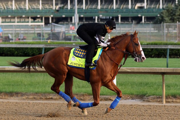 LOUISVILLE, KY - MAY 10: Kentucky Derby winner Justify, with exercise rider Humberto Gomez, gallops at Churchill Downs on May 10, 2018 in Louisville, Kentucky. It was his first visit to the track since his Kentucky Derby win five days earlier. (Photo by Mary M. Meek/Eclipse Sportswire/Getty Images)