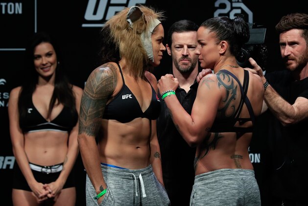 RIO DE JANEIRO, BRAZIL - MAY 11: Opponents Amanda Nunes (L) of Brazil and Raquel Pennington of the United States face off during the UFC 224 weigh-in at Jeunesse Arena on May 11, 2018 in Rio de Janeiro, Brazil. (Photo by Buda Mendes/Zuffa LLC/Zuffa LLC via Getty Images)