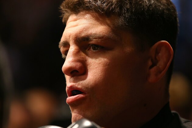 MONTREAL, QC - MARCH 16:  Nick Diaz prepares to enter the Octagon before his welterweight championship bout against Georges St-Pierre during the UFC 158 event at Bell Centre on March 16, 2013 in Montreal, Quebec, Canada.  (Photo by Jonathan Ferrey/Zuffa LLC/Zuffa LLC via Getty Images)