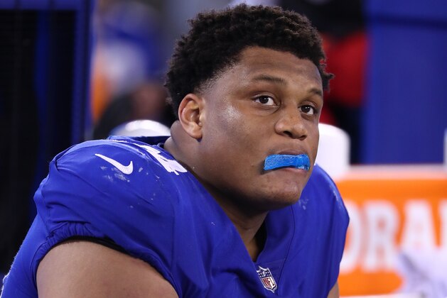 EAST RUTHERFORD, NJ - SEPTEMBER 18:   Ereck Flowers #74 of the New York Giants sits on the bench against the Detroit Lions during their game at MetLife Stadium on September 18, 2017 in East Rutherford, New Jersey.  (Photo by Al Bello/Getty Images)