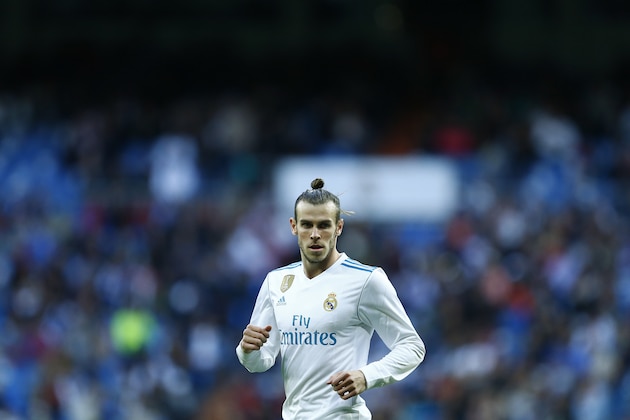 Real Madrid's Welsh forward Gareth Bale runs during the Spanish league football match between Real Madrid and Celta Vigo at the Santiago Bernabeu Stadium in Madrid on May 12, 2018. (Photo by Benjamin CREMEL / AFP)        (Photo credit should read BENJAMIN CREMEL/AFP/Getty Images)