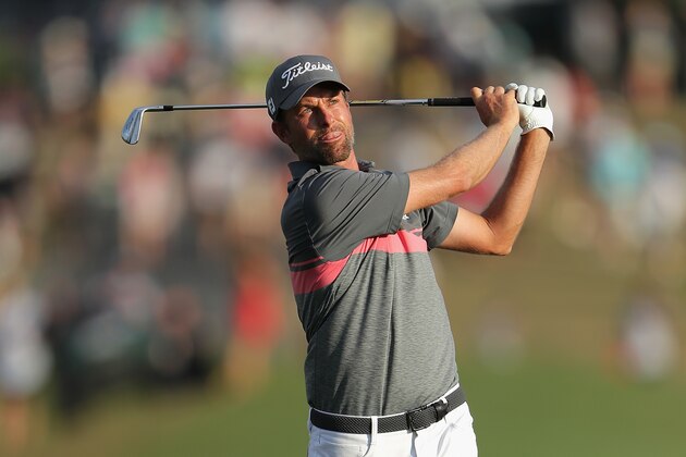 PONTE VEDRA BEACH, FL - MAY 12:  Webb Simpson of the United States plays a shot on the 18th hole during the third round of THE PLAYERS Championship on the Stadium Course at TPC Sawgrass on May 12, 2018 in Ponte Vedra Beach, Florida.  (Photo by Richard Heathcote/Getty Images)