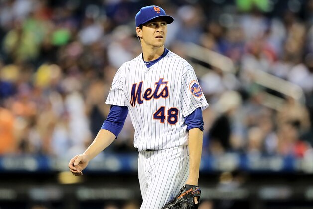 NEW YORK, NY - MAY 02:  Jacob deGrom #48 of the New York Mets walks off the field after the fourth inning against the Atlanta Braves on May 2, 2018 at Citi Field in the Flushing neighborhood of the Queens borough of New York City.  (Photo by Elsa/Getty Images)
