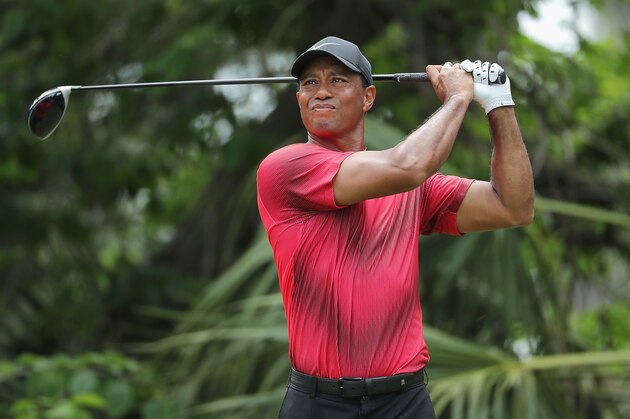 PONTE VEDRA BEACH, FL - MAY 13:  Tiger Woods of the United States plays his shot from the fifth tee during the final round of THE PLAYERS Championship on the Stadium Course at TPC Sawgrass on May 13, 2018 in Ponte Vedra Beach, Florida.  (Photo by Richard Heathcote/Getty Images)