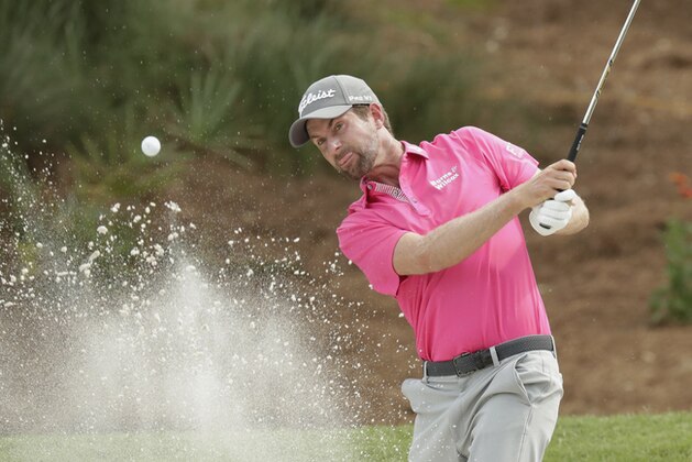 Webb Simpson hits from an eighth hole sand trap, during the final round of the The Players Championship golf tournament Sunday, May 13, 2018, in Ponte Vedra Beach, Fla. (AP Photo/John Raoux)