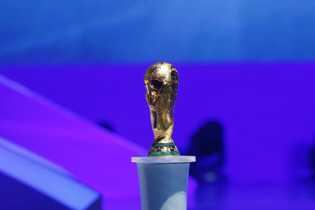 The World Cup trophy is displayed during the draw ceremony for the 2014 soccer World Cup in Costa do Sauipe near Salvador, Brazil, Friday, Dec. 6, 2013. (AP Photo/Victor R. Caivano)