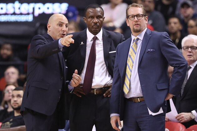TORONTO, ON - FEBRUARY 26: Head coach Dwane Casey of the Toronto Raptors listens to assistant coaches Rex Kalamian and Nick Nurse against the Portland Trail Blazers during NBA game action at Air Canada Centre on February 26, 2017 in Toronto, Canada. (Photo by Tom Szczerbowski/Getty Images) NOTE TO USER: User expressly acknowledges and agrees that, by downloading and or using this photograph, User is consenting to the terms and conditions of the Getty Images License Agreement. (Photo by Tom Szczerbowski/Getty Images)