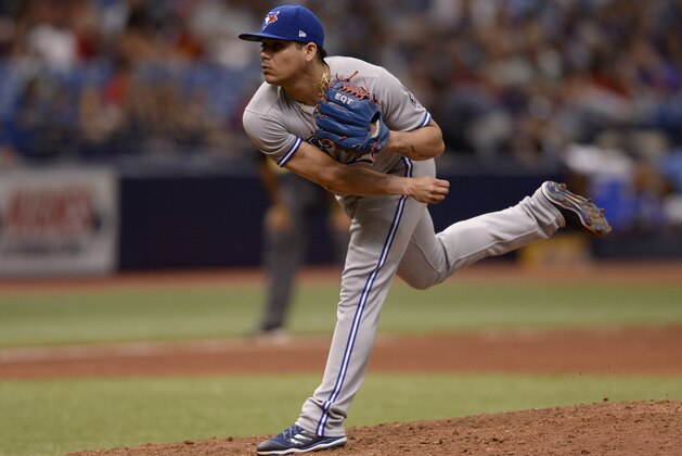 Toronto Blue Jays relief pitcher Roberto Osuna (54) throws a pitch during the ninth inning of a baseball game against the Tampa Bay Rays Sunday, May 6, 2018, in St. Petersburg, Fla. (AP Photo/Jason Behnken)