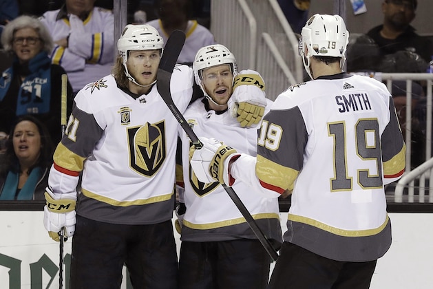 Vegas Golden Knights' Jonathan Marchessault, center, celebrates his goal with teammates William Karlsson, left, and Reilly Smith (19) during the second period of Game 6 of an NHL hockey second-round playoff series against the San Jose Sharks Sunday, May 6, 2018, in San Jose, Calif. (AP Photo/Marcio Jose Sanchez)
