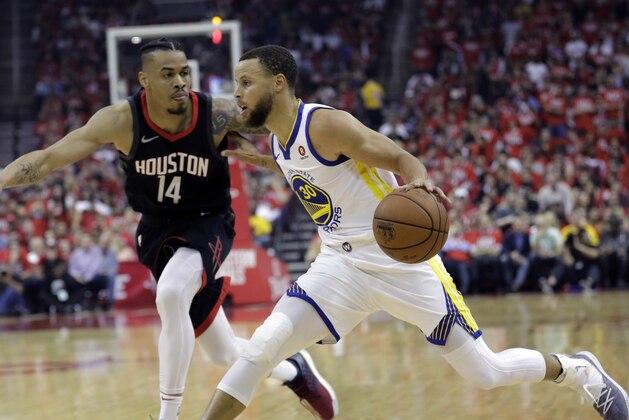 Golden State Warriors guard Stephen Curry (30) drives around Houston Rockets guard Gerald Green (14) during the first half of Game 1 of the NBA basketball Western Conference Finals, Monday, May 14, 2018, in Houston. (AP Photo/David J. Phillip)