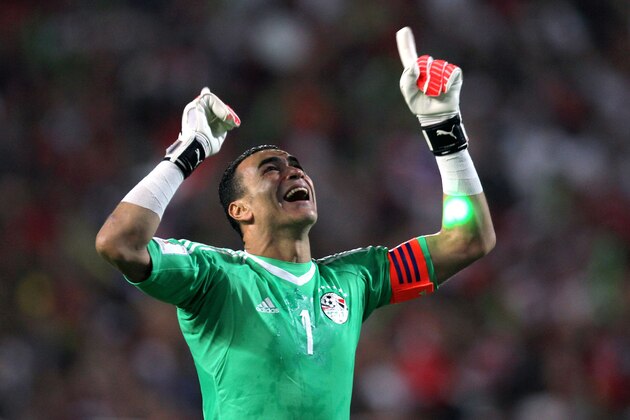 Egypt's Essam El-Hadary celebrates wining against Congo's team during their World Cup 2018 Africa qualifying match between Egypt and Congo at the Borg el-Arab stadium in Alexandria on October 8, 2017.
Liverpool striker Mohamed Salah converted a stoppage-time penalty to give Egypt a dramatic 2-1 win over Congo Brazzaville Sunday and a place at the 2018 World Cup in Russia. / AFP PHOTO / TAREK ABDEL HAMID        (Photo credit should read TAREK ABDEL HAMID/AFP/Getty Images)