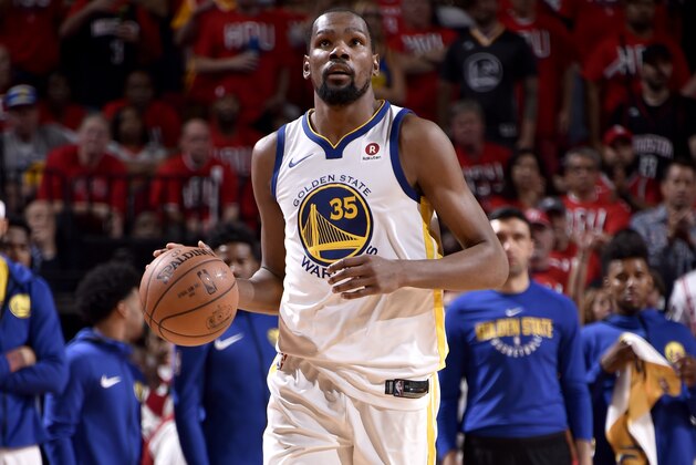 HOUSTON, TX - MAY 14:  Kevin Durant #35 of the Golden State Warriors handles the ball against the Houston Rockets in Game One of the Western Conference Finals of the 2018 NBA Playoffs on May 14, 2018 at the Toyota Center in Houston, Texas. NOTE TO USER: User expressly acknowledges and agrees that, by downloading and or using this photograph, User is consenting to the terms and conditions of the Getty Images License Agreement. Mandatory Copyright Notice: Copyright 2018 NBAE (Photo by Bill Baptist/NBAE via Getty Images)