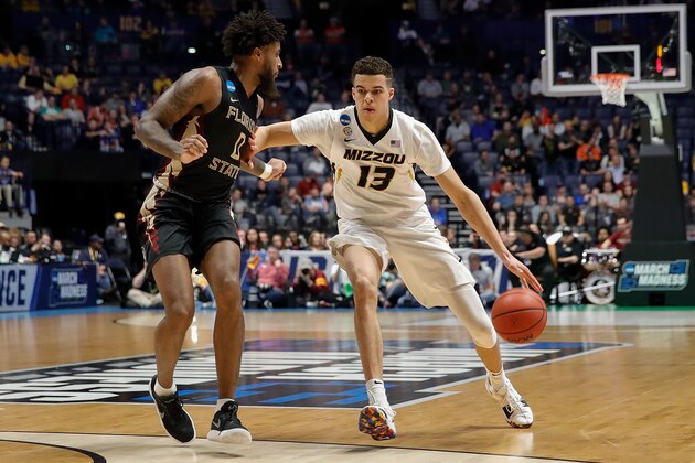 NASHVILLE, TN - MARCH 16:  Michael Porter Jr. #13 of the Missouri Tigers plays against Phil Cover #00 of the Florida State Seminoles during the first round of the 2018 NCAA Men's Basketball Tournament at Bridgestone Arena on March 16, 2018 in Nashville, Tennessee.  (Photo by Frederick Breedon/Getty Images)
