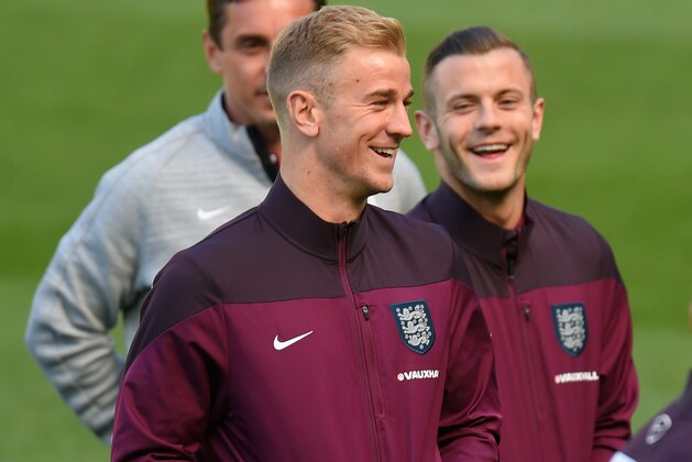 DUBLIN, IRELAND - JUNE 06:  England players Joe Hart (l) and Jack Wilshere shares a joke during the pitch walk round ahead of Sunday's friendly internmational against the Republic of Ireland at Aviva Stadium on June 6, 2015 in Dublin, Ireland.  (Photo by Stu Forster/Getty Images)