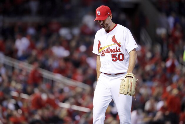 St. Louis Cardinals' Adam Wainwright walks off the field after being removed during the fourth inning of a baseball game against the Arizona Diamondbacks Thursday, April 5, 2018, in St. Louis. (AP Photo/Jeff Roberson)