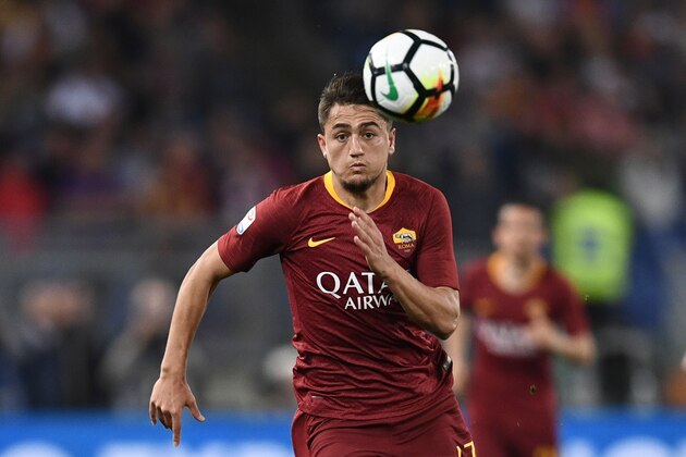 Roma's Turkish midfielder Cengiz Under runs for the ball during the Italian Serie A football match AS Roma vs Juventus at the Olympic stadium on May 13, 2018 in Rome. (Photo by Filippo MONTEFORTE / AFP)        (Photo credit should read FILIPPO MONTEFORTE/AFP/Getty Images)