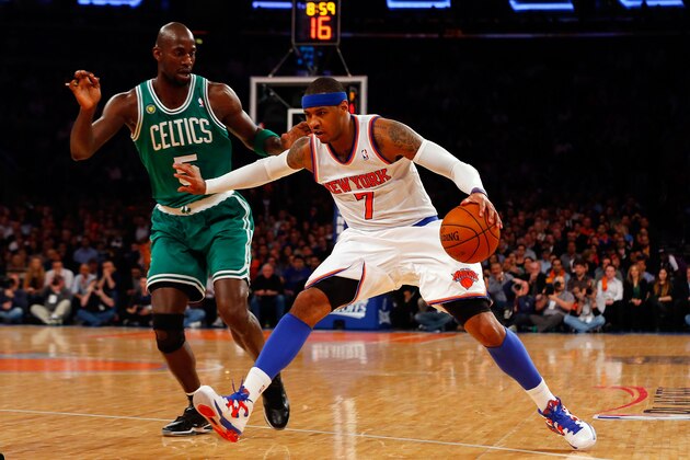 NEW YORK, NY - APRIL 23:  (NEW YORK DAILIES OUT)    Carmelo Anthony #7 of the New York Knicks in action against Kevin Garnett #5 of the Boston Celtics during Game Two of the Eastern Conference Quarterfinals of the 2013 NBA Playoffs on April 23, 2013 at Madison Square Garden in New York City. The Knicks defeated the Celtics 87-71. NOTE TO USER: User expressly acknowledges and agrees that, by downloading and/or using this Photograph, user is consenting to the terms and conditions of the Getty Images License Agreement.  (Photo by Jim McIsaac/Getty Images)