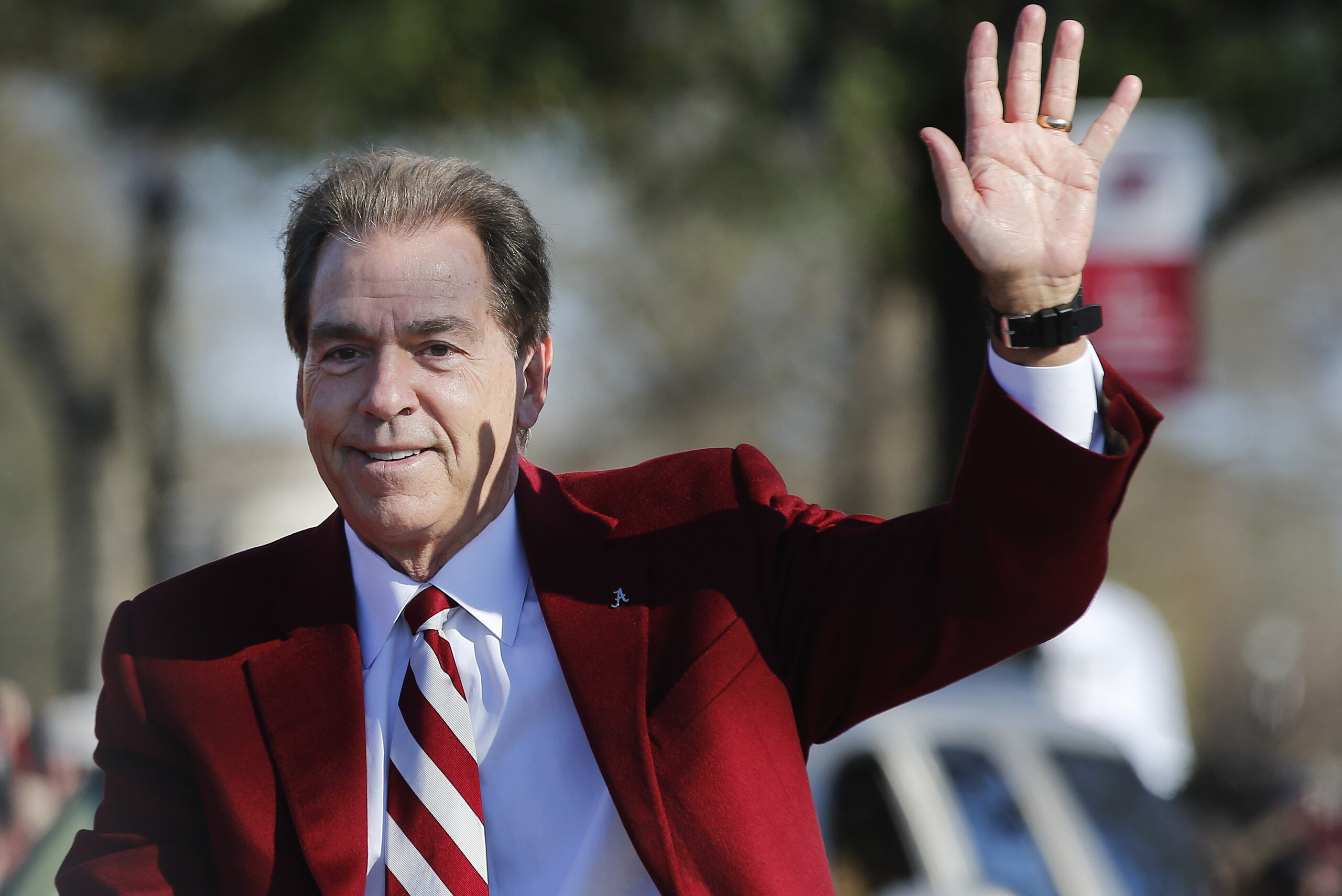 Alabama's coach Nick Saban waves to fans as he parades down the street during the NCAA college football national championship parade, Saturday, Jan. 20, 2018, in Tuscaloosa, Ala. Alabama won the national championship game against Georgia 26-23 in overtime. (AP Photo/Brynn Anderson) Alabama's coach Nick Saban waves to fans as he parades down the street during the NCAA college football national championship parade, Saturday, Jan. 20, 2018, in Tuscaloosa, Ala. Alabama won the national championship game against Georgia 26-23 in overtime. (AP Photo/Brynn Anderson)
