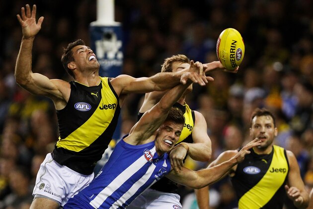 MELBOURNE, AUSTRALIA - MAY 13:  Alex Rance of the Tigers spoils the ball during the 2018 AFL round eight match between the North Melbourne Kangaroos and the Richmond Tigers at Etihad Stadium on May 13, 2018 in Melbourne, Australia.  (Photo by Daniel Pockett/AFL Media/Getty Images)