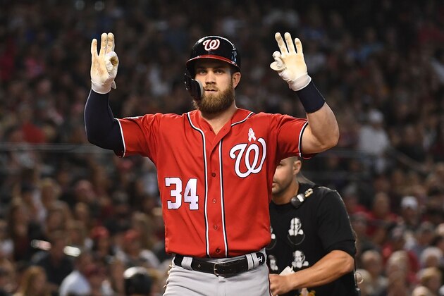 PHOENIX, AZ - MAY 13:  Bryce Harper #34 of the Washington Nationals celebrates a solo home run in the third inning of the MLB game against the Arizona Diamondbacks at Chase Field on May 13, 2018 in Phoenix, Arizona.  (Photo by Jennifer Stewart/Getty Images)
