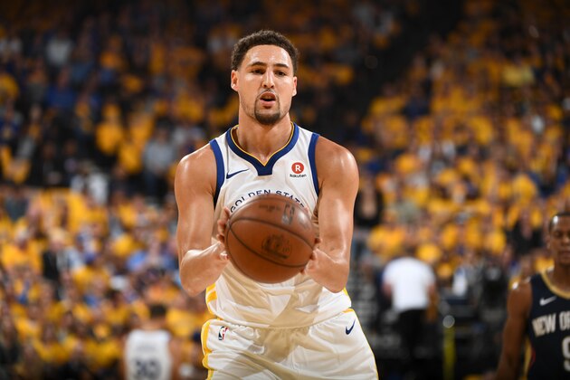 OAKLAND, CA - MAY 8:  Klay Thompson #11 of the Golden State Warriors passes the ball against the New Orleans Pelicans in Game Five of the Western Conference Semifinals of the 2018 NBA Playoffs on May 8, 2018 at Oracle Arena in Oakland, California. NOTE TO USER: User expressly acknowledges and agrees that, by downloading and or using this photograph, user is consenting to the terms and conditions of Getty Images License Agreement. Mandatory Copyright Notice: Copyright 2018 NBAE (Photo by Garrett Ellwood/NBAE via Getty Images)