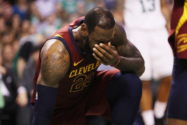 BOSTON, MA - MAY 15:  LeBron James #23 of the Cleveland Cavaliers reacts after being hit in the face in the first half against the Boston Celtics during Game Two of the 2018 NBA Eastern Conference Finals at TD Garden on May 15, 2018 in Boston, Massachusetts. NOTE TO USER: User expressly acknowledges and agrees that, by downloading and or using this photograph, User is consenting to the terms and conditions of the Getty Images License Agreement.  (Photo by Maddie Meyer/Getty Images)