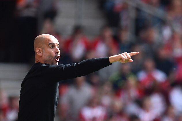 Manchester City's Spanish manager Pep Guardiola gestures from the touch line during the English Premier League football match between Southampton and Manchester City at St Mary's Stadium in Southampton, southern England on May 13, 2018. (Photo by Glyn KIRK / AFP) / RESTRICTED TO EDITORIAL USE. No use with unauthorized audio, video, data, fixture lists, club/league logos or 'live' services. Online in-match use limited to 75 images, no video emulation. No use in betting, games or single club/league/player publications. /         (Photo credit should read GLYN KIRK/AFP/Getty Images)