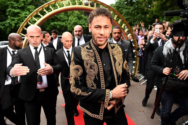 TOPSHOT - Paris Saint-Germain's Brazilian forward Neymar arrives for a TV show on May 13, 2018 in Paris, as part of the 27th edition of the UNFP (French National Professional Football players Union) trophy ceremony. (Photo by FRANCK FIFE / AFP)        (Photo credit should read FRANCK FIFE/AFP/Getty Images)
