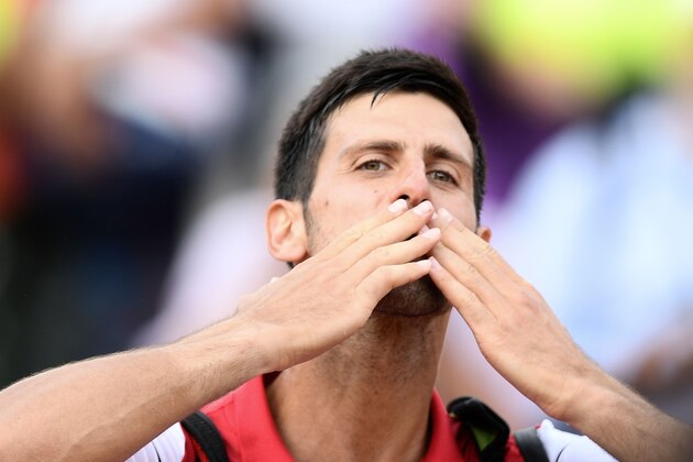 Serbia's Novak Djokovic celebrates after winning his match against Georgia's Nikoloz Basilashvili during Rome's ATP Tennis Open tournament at the Foro Italico, on May 16, 2018 in Rome. (Photo by Filippo MONTEFORTE / AFP)        (Photo credit should read FILIPPO MONTEFORTE/AFP/Getty Images)